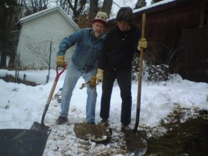 Michael and Jane and a stone dug out of the the tree hole